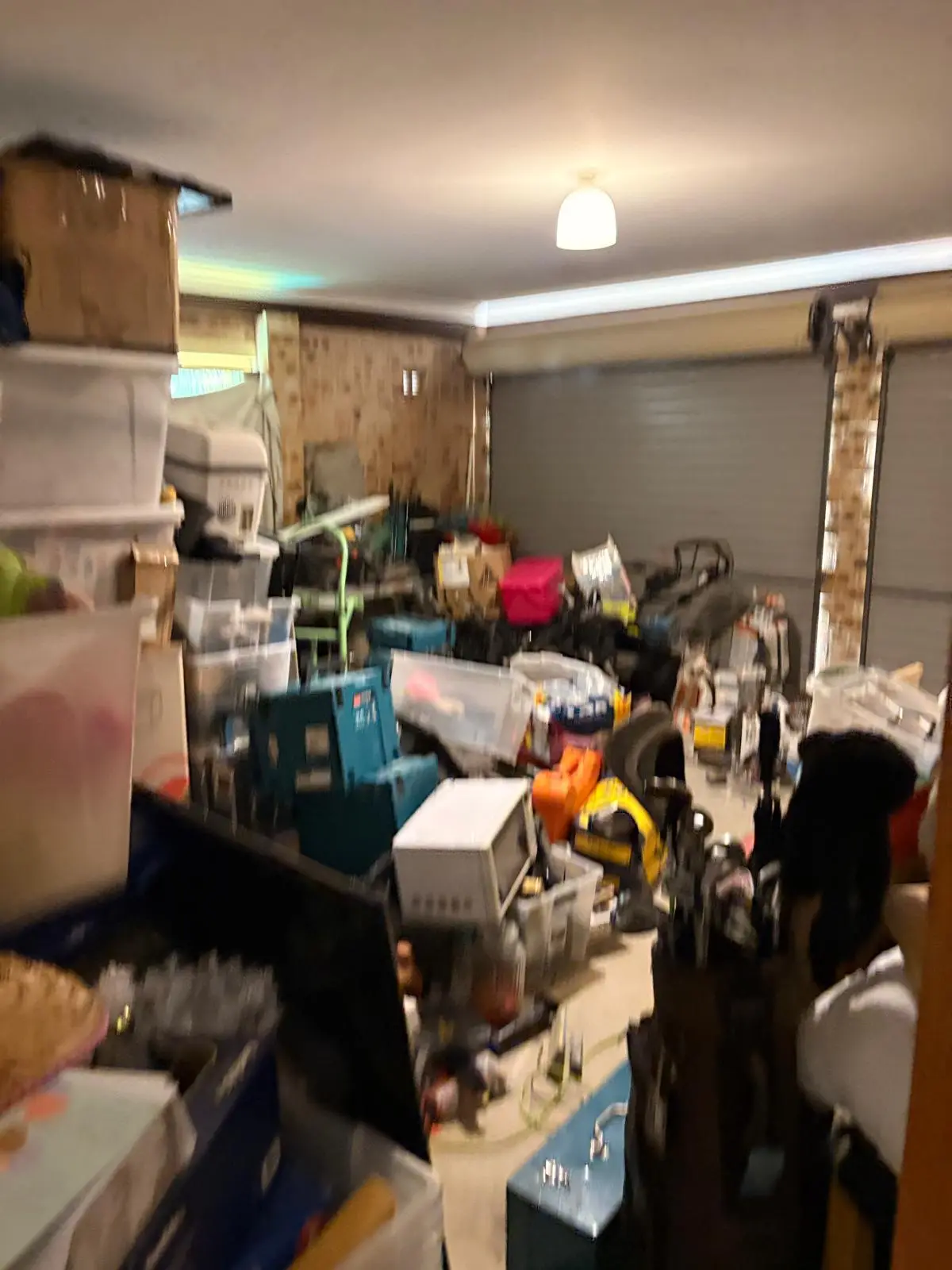Tired long-term rental — accumulated belongings, candid context shot